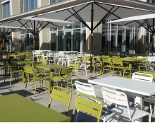 Stackable steel garden chair with armrests Star