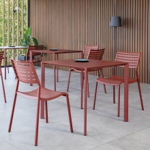 Stackable polypropylene chair with steel legs Nina