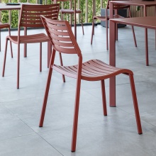 Stackable polypropylene chair with steel legs Nina