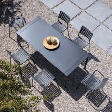 Stackable polypropylene armchair with steel legs Nina