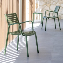 Stackable polypropylene armchair with steel legs Nina